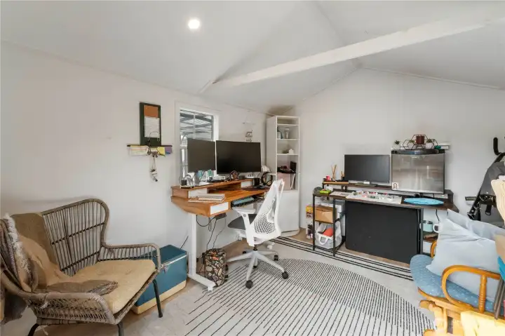 Interior of detached outbuilding with power. Ideal for office, workout, hobby or studio space!