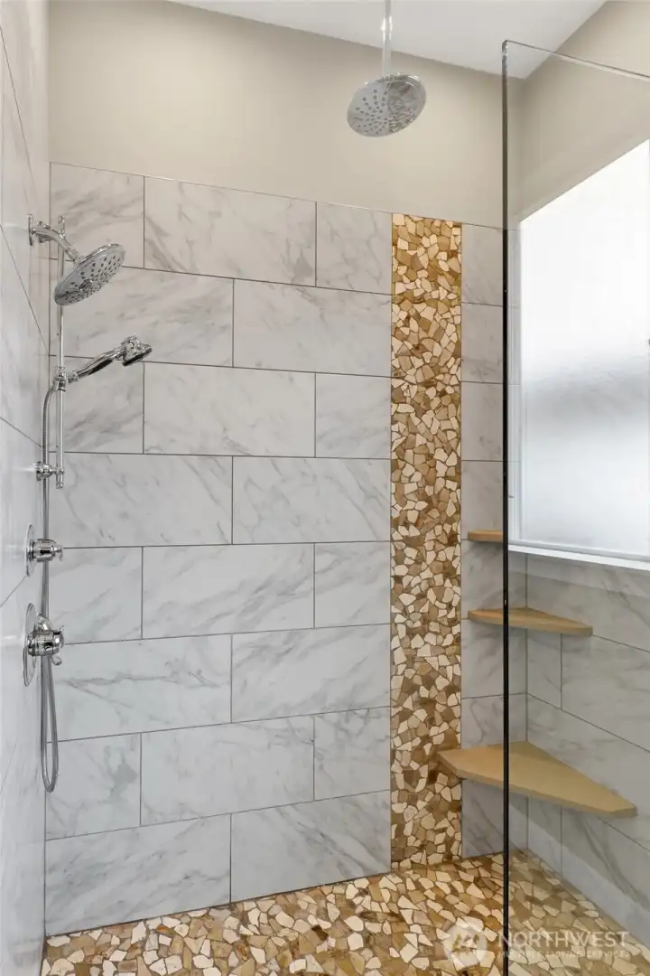 The lower level bathroom features this beautiful shower