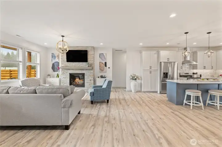 The doorway on the opposite side of the main living area leads to the additional bedroom, office/den, and guest bath, creating a well-separated and functional layout for privacy and convenience.