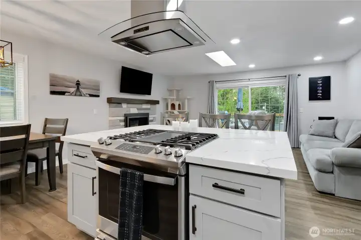 The Gourmet sized kitchen with open concept is amazing. Cook and visit with guests!