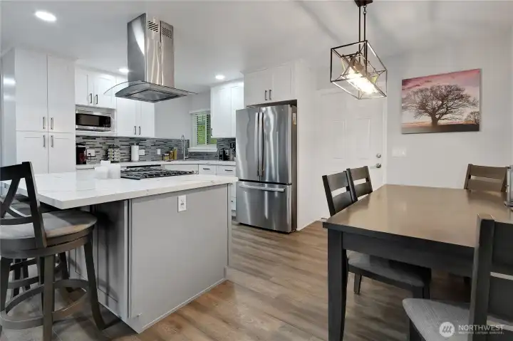 The dining room area is nice sized and will fit most table sets.