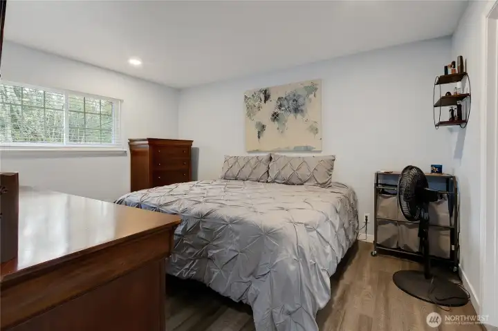 The primary bedroom is very nice sized, this is a king size bed. Wait until you see the bathroom and closet!