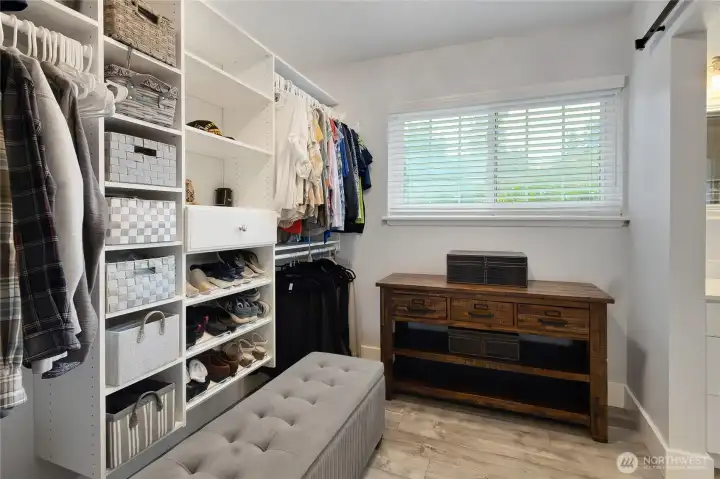 The crown jewel---this amazing walk in primary bedroom closet! There is room for everything!