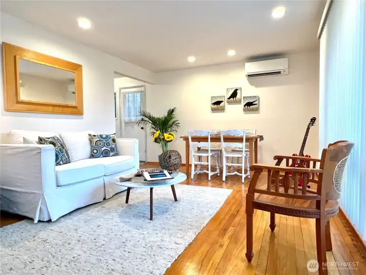 Step into the light and bright great room. You will notice the original oak floors and updated energy systems.