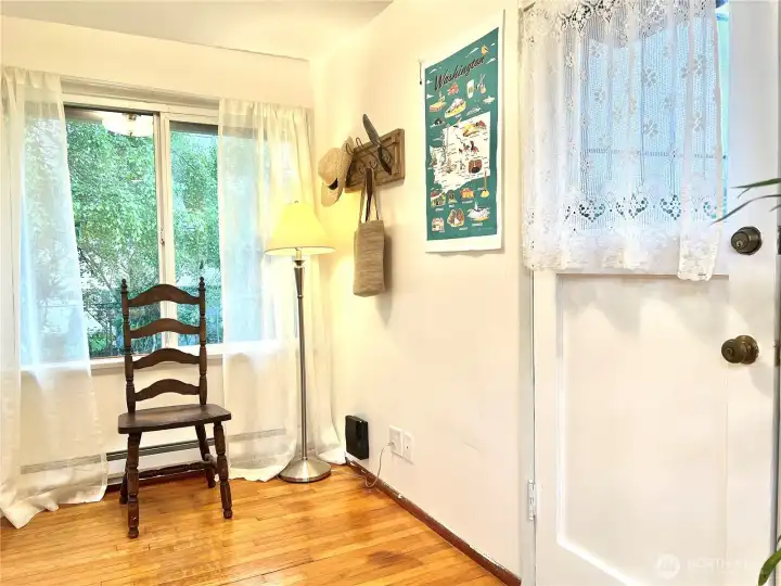 The back door is conviently placed. Plenty of room to build a "drop zone" here for returning with items from the back yard.