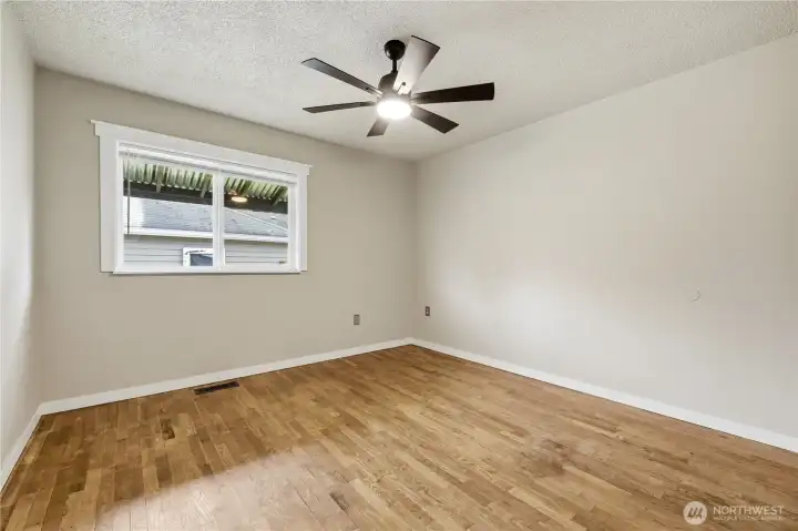 Bedroom #2 with original hardwood floors
