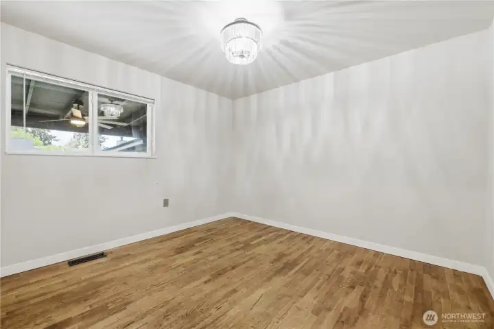 Bedroom #3 with original hardwood floors