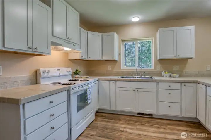 Tile countertops in kitchen