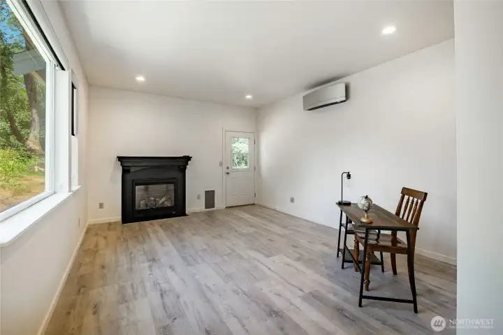 Family room off main entrance looking to the lleft Family room off main entrance looking to the lleft