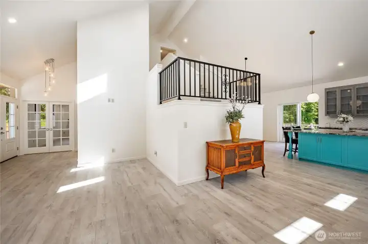 upstairs balcony looks over living room, kitchen and dining room. upstairs balcony looks over living room, kitchen and dining room.