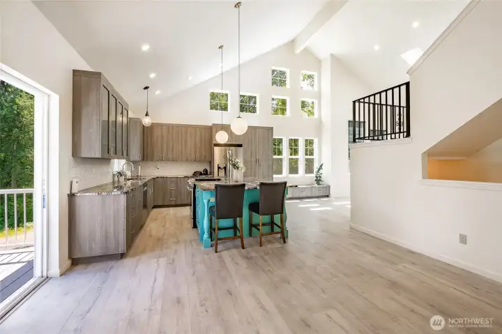 Looking at kitchen from dining room w/ slider to deck Looking at kitchen from dining room w/ slider to deck