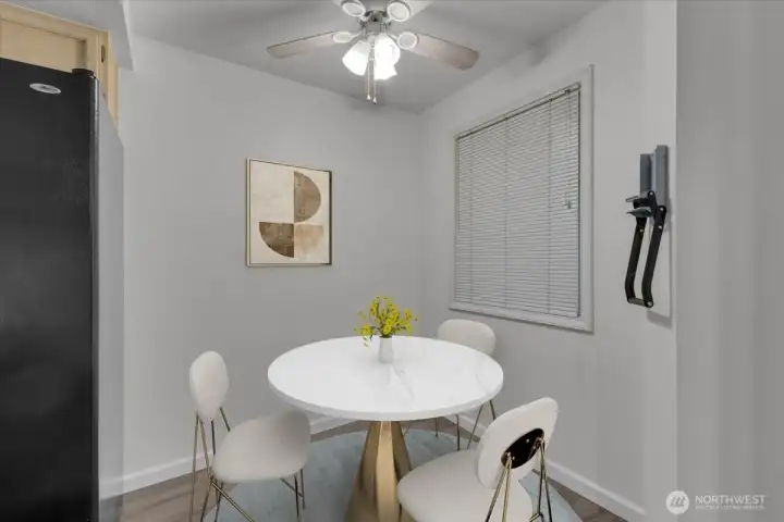 Dinette space off the kitchen. It can also be used as a work space. Dinette space off the kitchen. It can also be used as a work space.