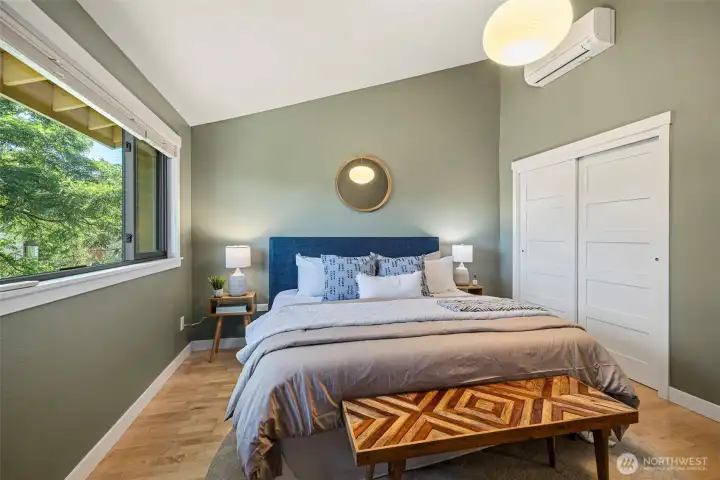Spacious primary with high ceilings & mini split Spacious primary with high ceilings & mini split