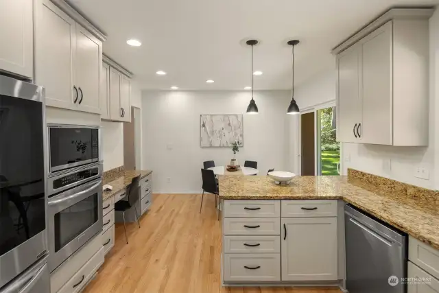 Granite countertops, stainless steel appliances and new light fixtures
