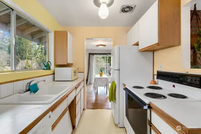 Kitchen heading into the dining space