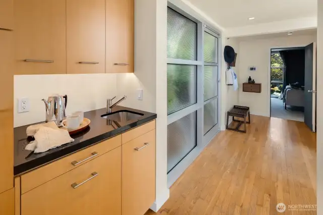 -Convenient prep sink and 3 floor dumbwaiter are just a few of the special touches in this one-of-a-kind home.
