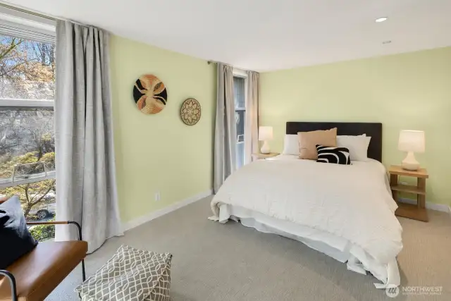 -A third bedroom is so much more than that, thanks to its full bath with soaking tub and wall-to-floor windows.