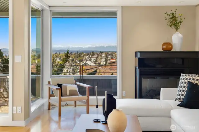 -Winter views of the occasional Seattle snowfall are best witnessed while reveling in the warmth of the gas fireplace.