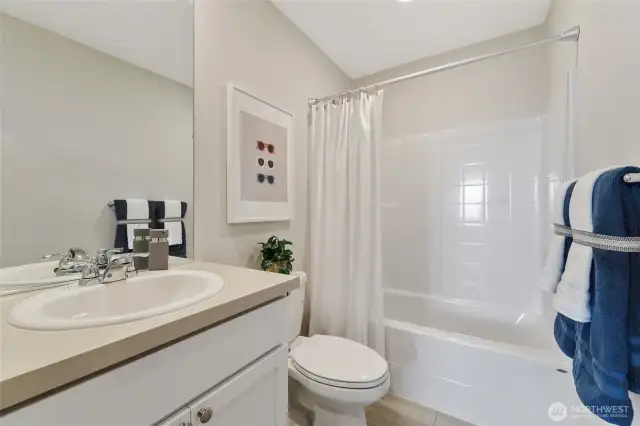 See supplements for colors in home. Home has gray cabinets.