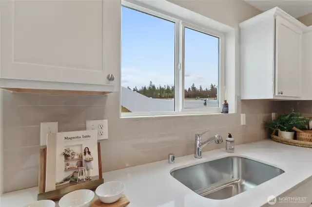 See supplements for colors in home. Home has gray cabinets.