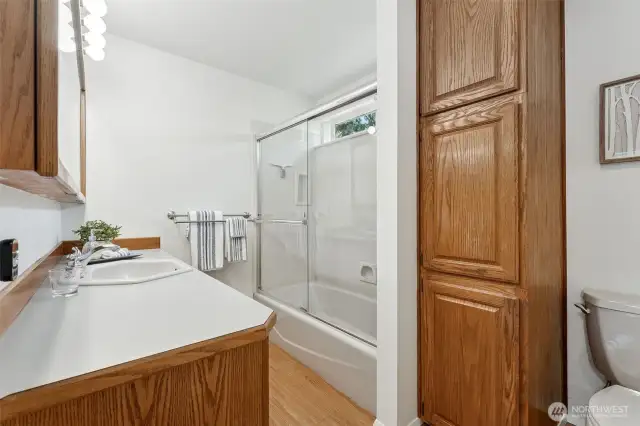 Spacious main bath on the upper level of this Tri-Level home.  Lots of counter & storage space here!