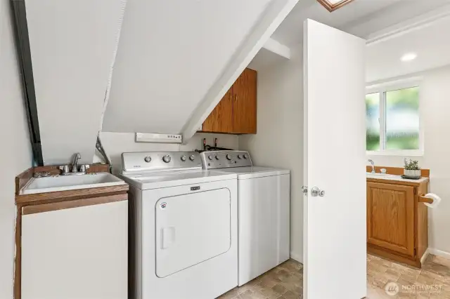 Laundry complete with utility sink for pre-soaking laundry or those messy yard cleanups!