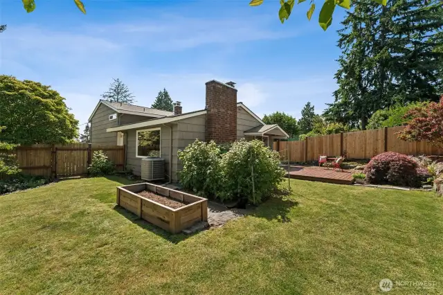 Raised bed is ready for your green thumb too.  Home also comes equipped with a heat pump for those warm, summer days!