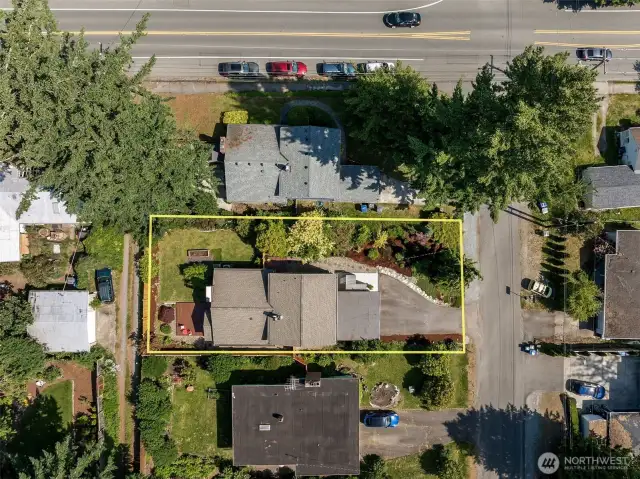 Full property aerial...don't miss the "columnar" apple trees in the front side yard...there are different varieties all well producing fruit trees but easy to maintain.