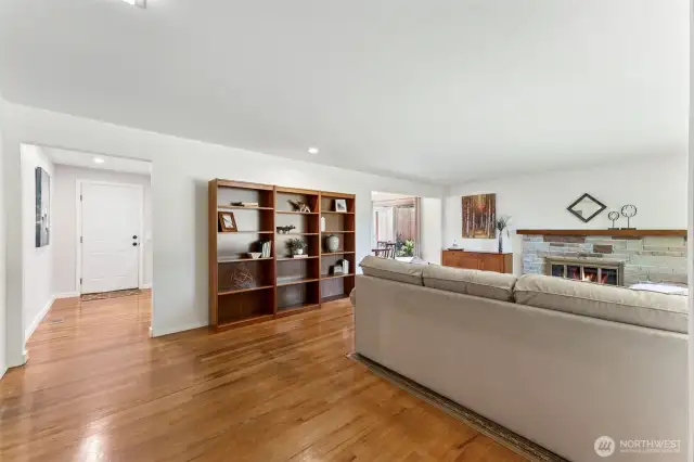 From the entry door you see the living space leading into the kitchen and dining areas.  All flooded with great natural light!