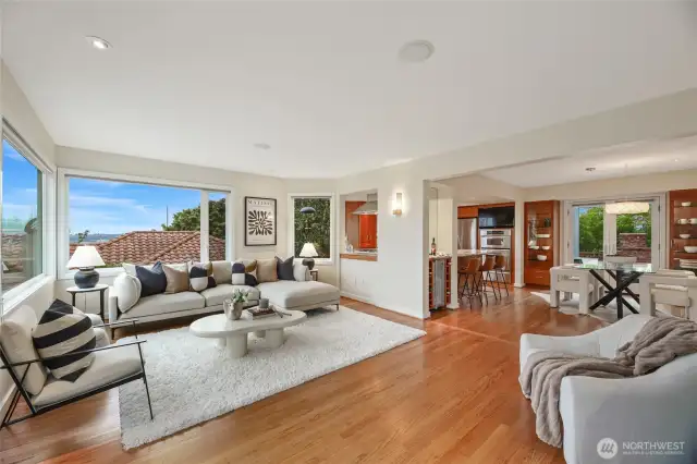 The living room flows effortlessly into the dining room and kitchen.