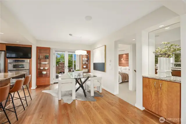 The dining room with built in cabinetry maximizes storage and convenience.