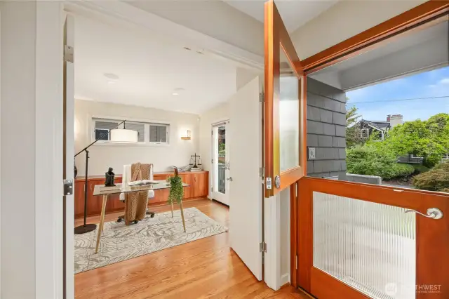 The front entry features a beautiful Dutch door