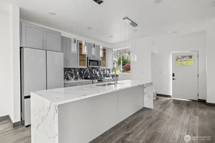 Interior photos used in this presale listing are from newly constructed homes by the same builder, located at 8608 and 8612 #C, 42nd Ave S. The layout and high finishes will be similar.