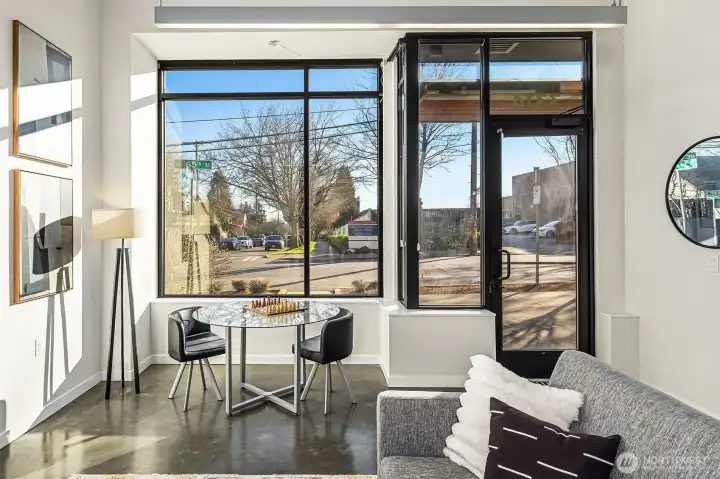 Extra tall windows flood the interior with natural light