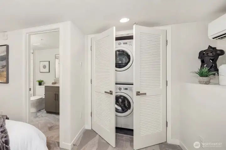 Full size washer and dryer within the bedroom