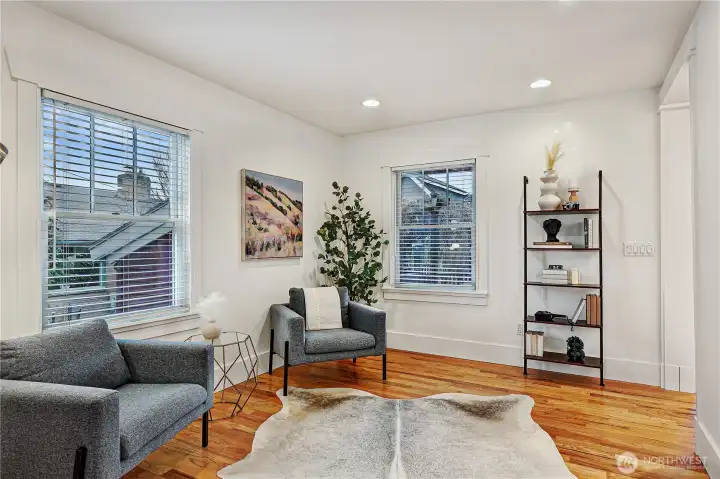 archway in back of den enters into the dining room off the back of the kitchen.