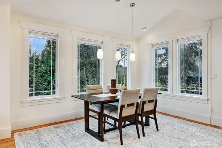 Spacious Dining room with windows out to back yard