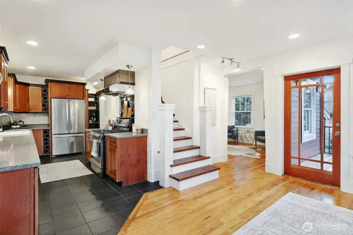 Back door off kitchen opens to back deck and yard.