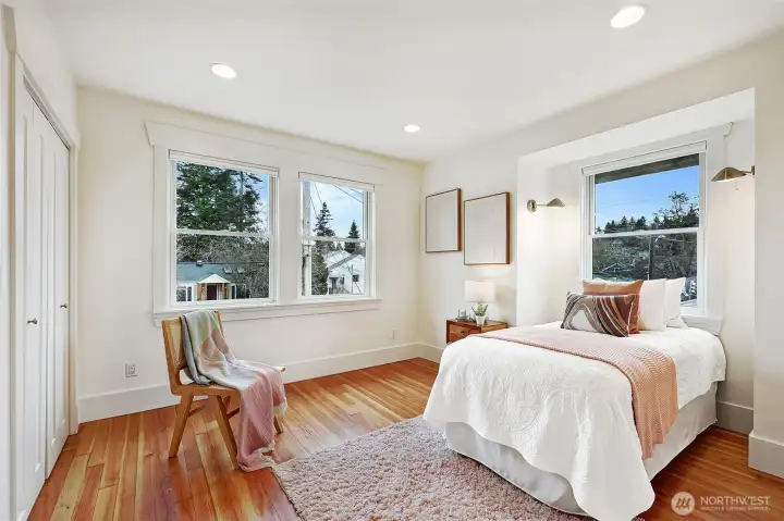 Widows in second and third bedrooms bring in light from two sides.