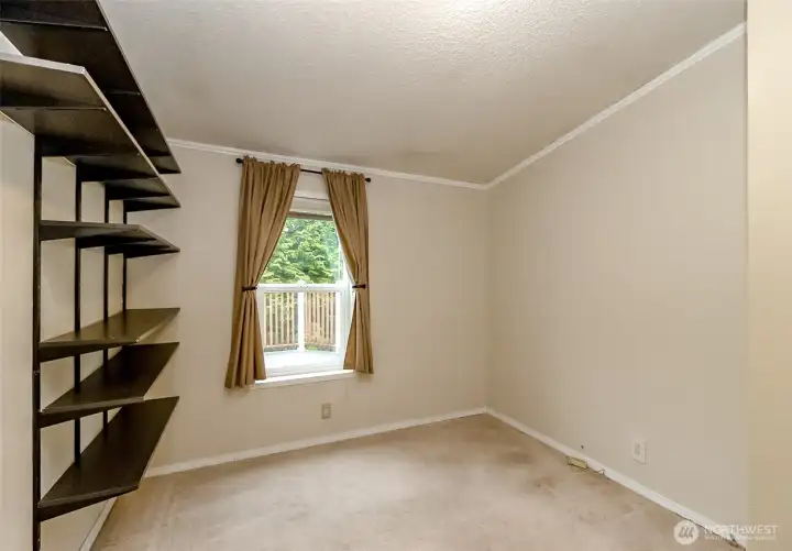 Open concept office den behind the kitcchen in the hallway to the other bedrooms