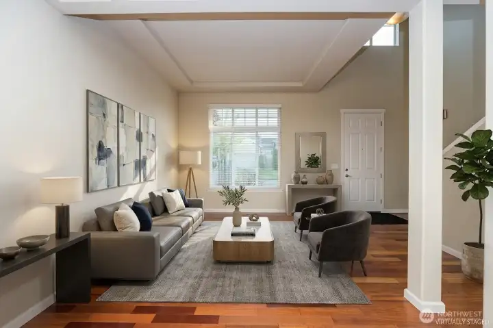 Entry into living room.  Virtually staged.