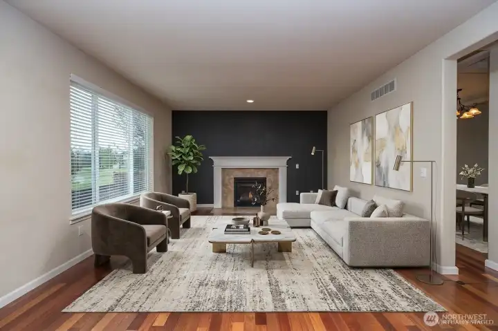 Great room with gas fireplace.  Virtually staged.