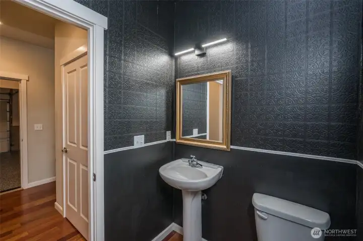 Half bath off the garage and the kitchen.