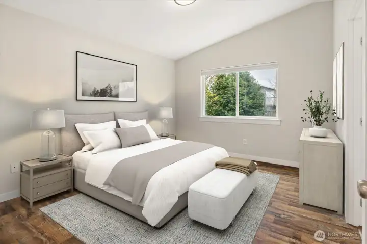 Primary ensuite with full bath and walk-in closet