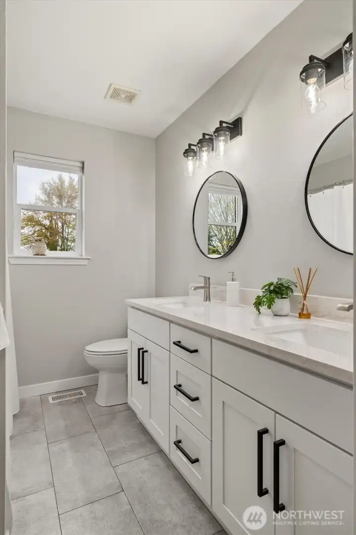 Primary full-bath Fully remodeled with a polished urban-inspired vibe