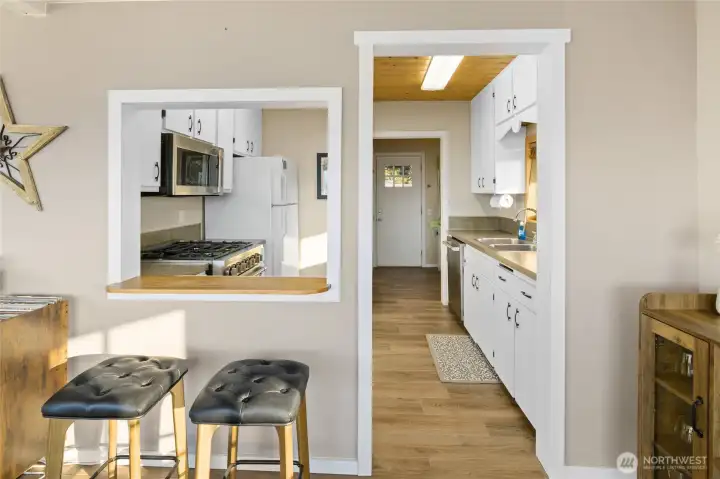 Looking at the kitchen from the dining room.