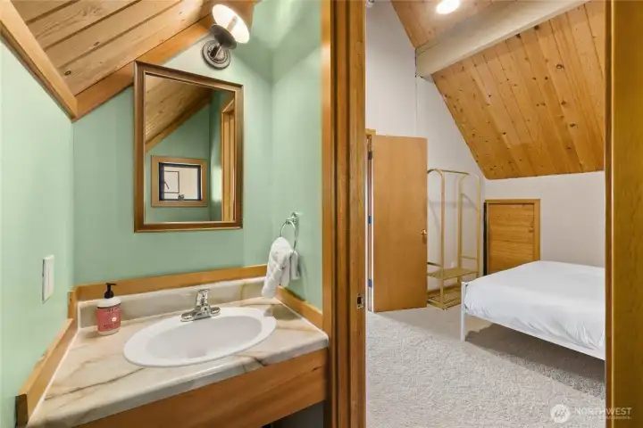 Upstairs half bath.