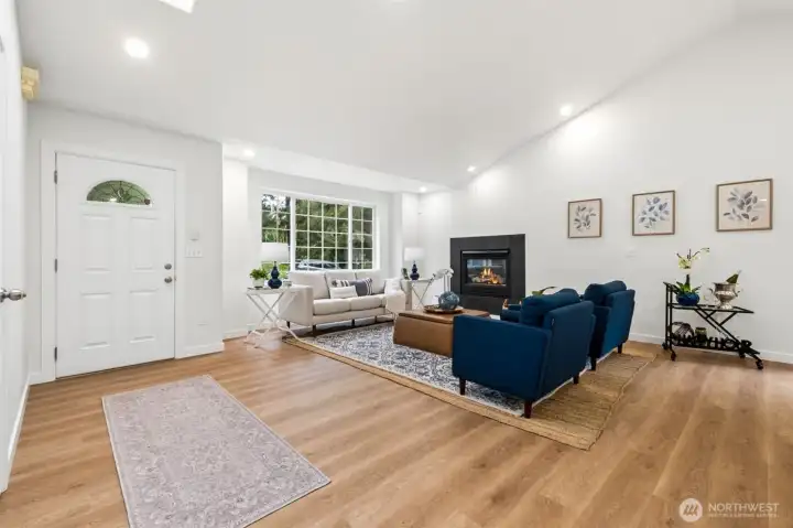 New LVP flooring adds durability and style throughout the main living areas. The seamless flow makes the home feel spacious, airy, and perfect for everyday living. New recessed lighting and lighting package throughout.