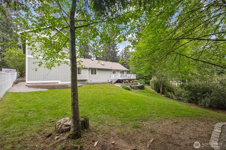 Whether you envision a garden, play area, or simply extra privacy, the space is yours to shape.    The greenbelt backdrop creates a peaceful, natural setting rarely found in neighborhood living. It enhances privacy and adds to the home’s retreat-like feel.