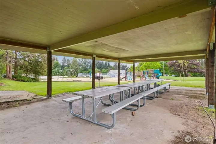 The Maple Hills picnic area is a favorite gathering spot for neighbors of all ages. Surrounded by tall evergreens and open green space, it offers a relaxed setting for casual meals, birthday parties, or weekend hangouts. It’s a welcoming place where residents can slow down, connect, and enjoy the outdoors right in the heart of the community.